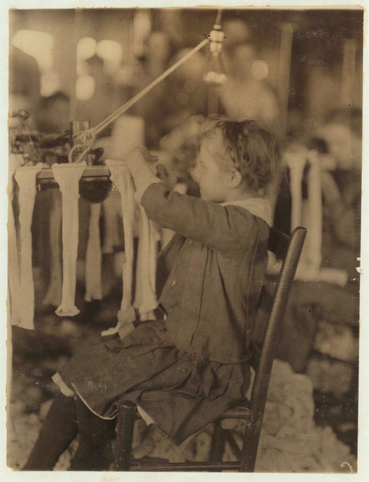A young worker at the Cherokee Hosiery Mill, Rome, April 10, 1913